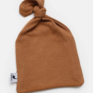 camel ribbed top knot hat