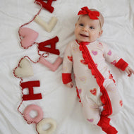 A Baby Station Valentine’s Day Bamboo Ruffle Onesie